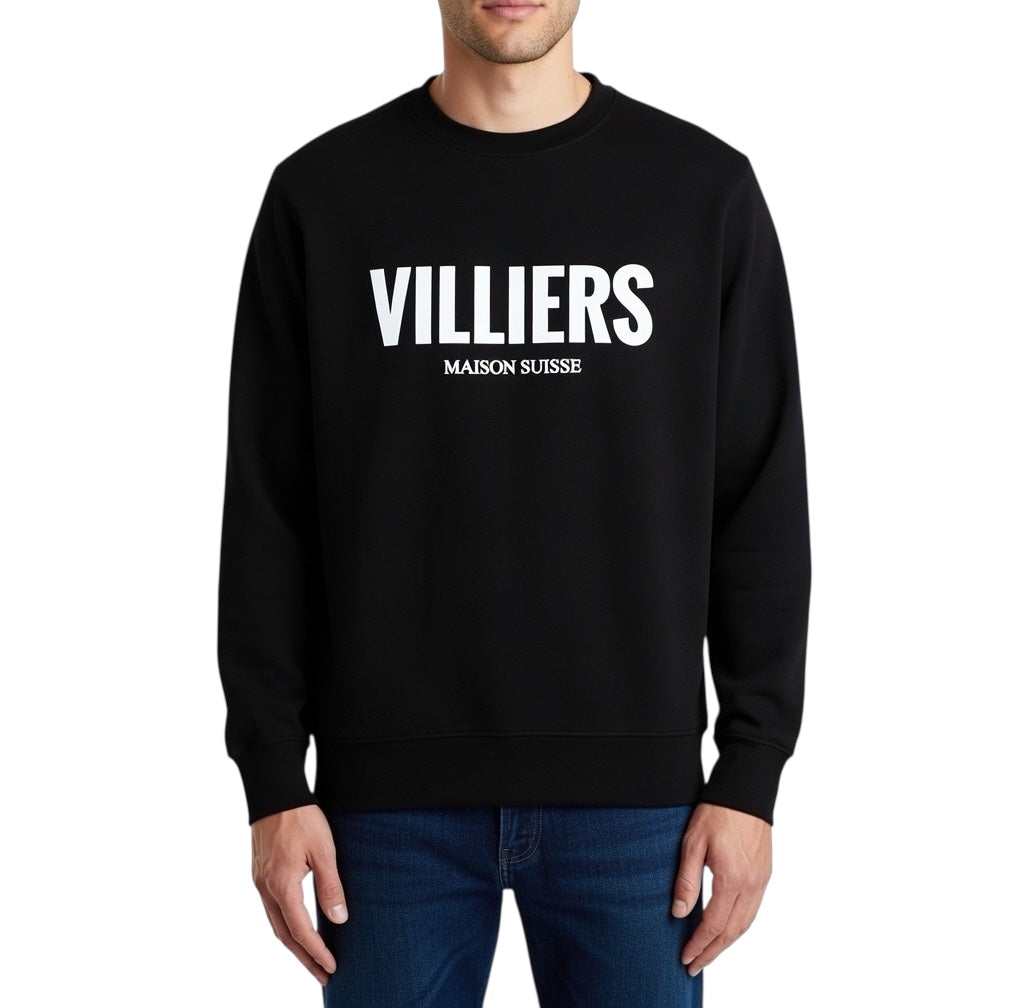Herren Premium Sweatshirt von VILLIERS MAISON SUISSE in Schwarz mit weissem Logo auf der Brust, getragen von einem Model in Frontansicht.